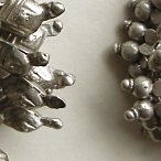 Kuchi silver pendants